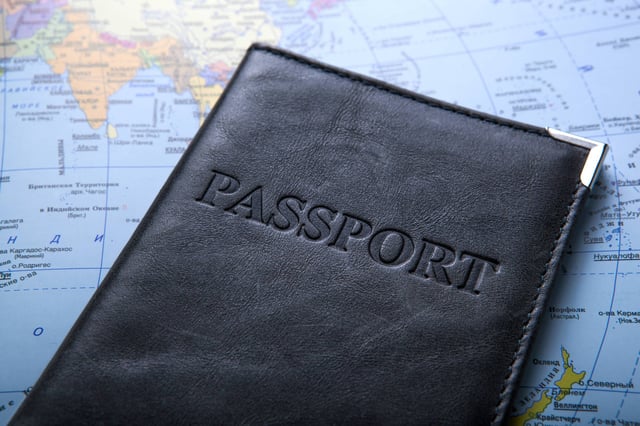 Black Passport Cover On World Map