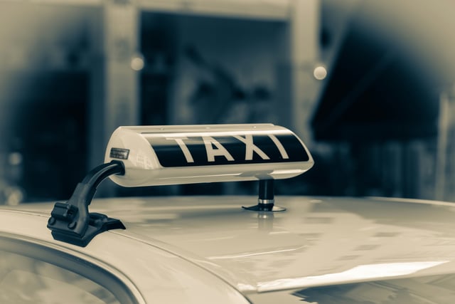 Taxi Sign On Car Roof Sepia Tone