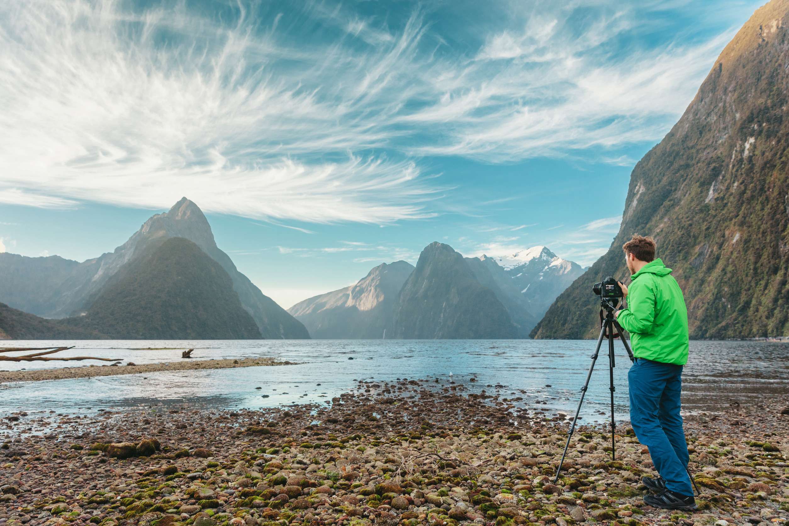 Professional camera on tripod on adventure travel